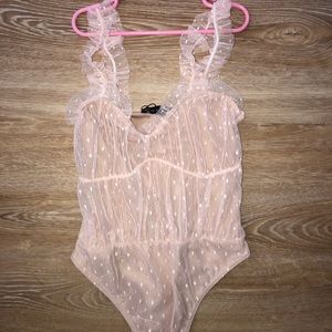 Pretty little thing light pink body suit